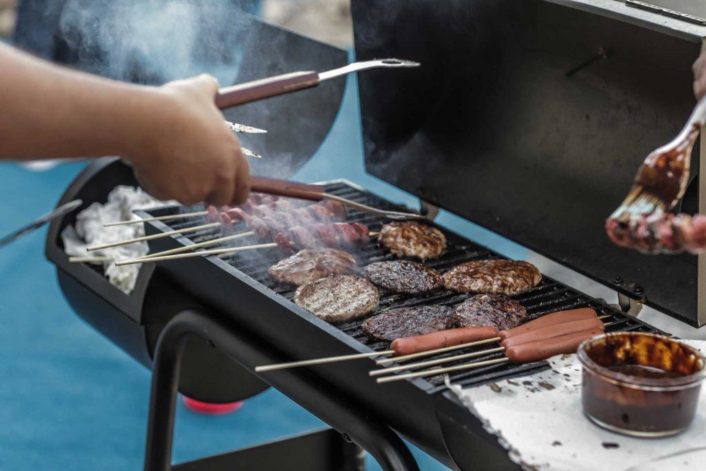 meat cooking on barbecue