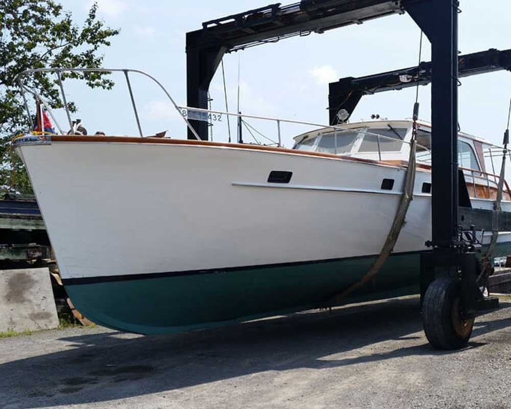 large boat being brought ashore